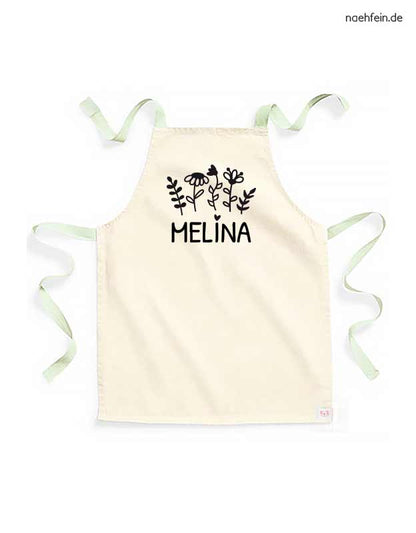 personalisierte Kinderschürze mit Namen im Blumen Design - pistazie mit schwarz