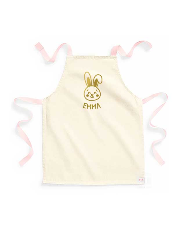 personalisierte Kinderschuerze mit Namen - beige Kinderschuerze mit peach & Aufdruck gold