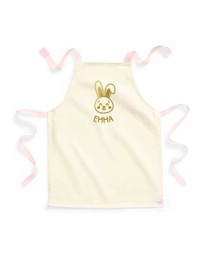 personalisierte Kinderschuerze mit Namen - beige Kinderschuerze mit peach & Aufdruck gold