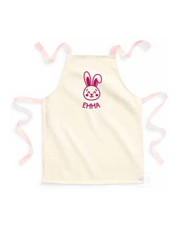 personalisierte Kinderschuerze mit Namen - beige Kinderschuerze mit peach & Aufdruck pink
