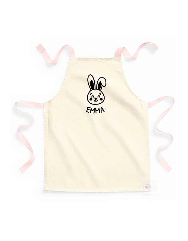personalisierte Kinderschuerze mit Namen - beige Kinderschuerze mit Peach & Aufdruck Schwarz