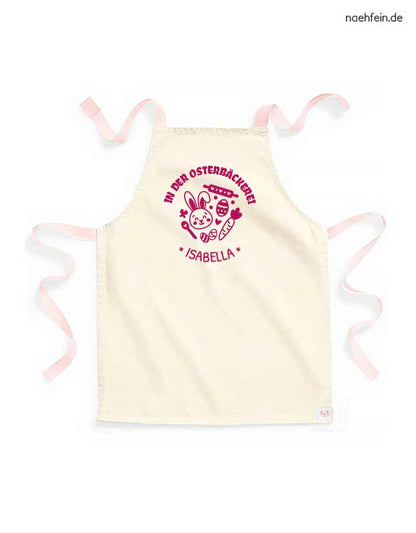 Kinderschürze mit Namen - Backschürze Ostern in der Osterbäckerei Design - peach mit pinkem Aufdruck