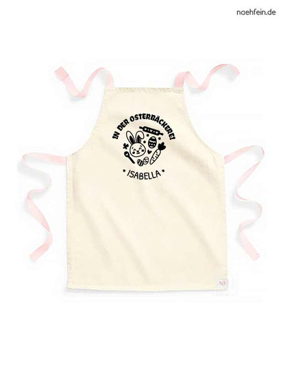 Kinderschürze mit Namen - Backschürze Ostern in der Osterbäckerei Design - peach mit schwarzem Aufdruck